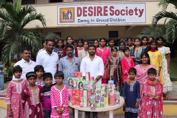 Maadri PrithviRaj Distributing Cracker to Desire Society